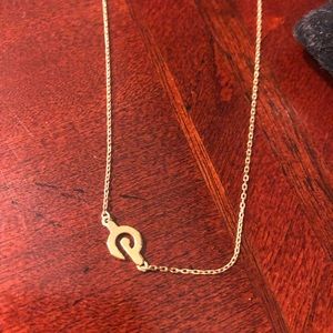 Peloton gold necklace